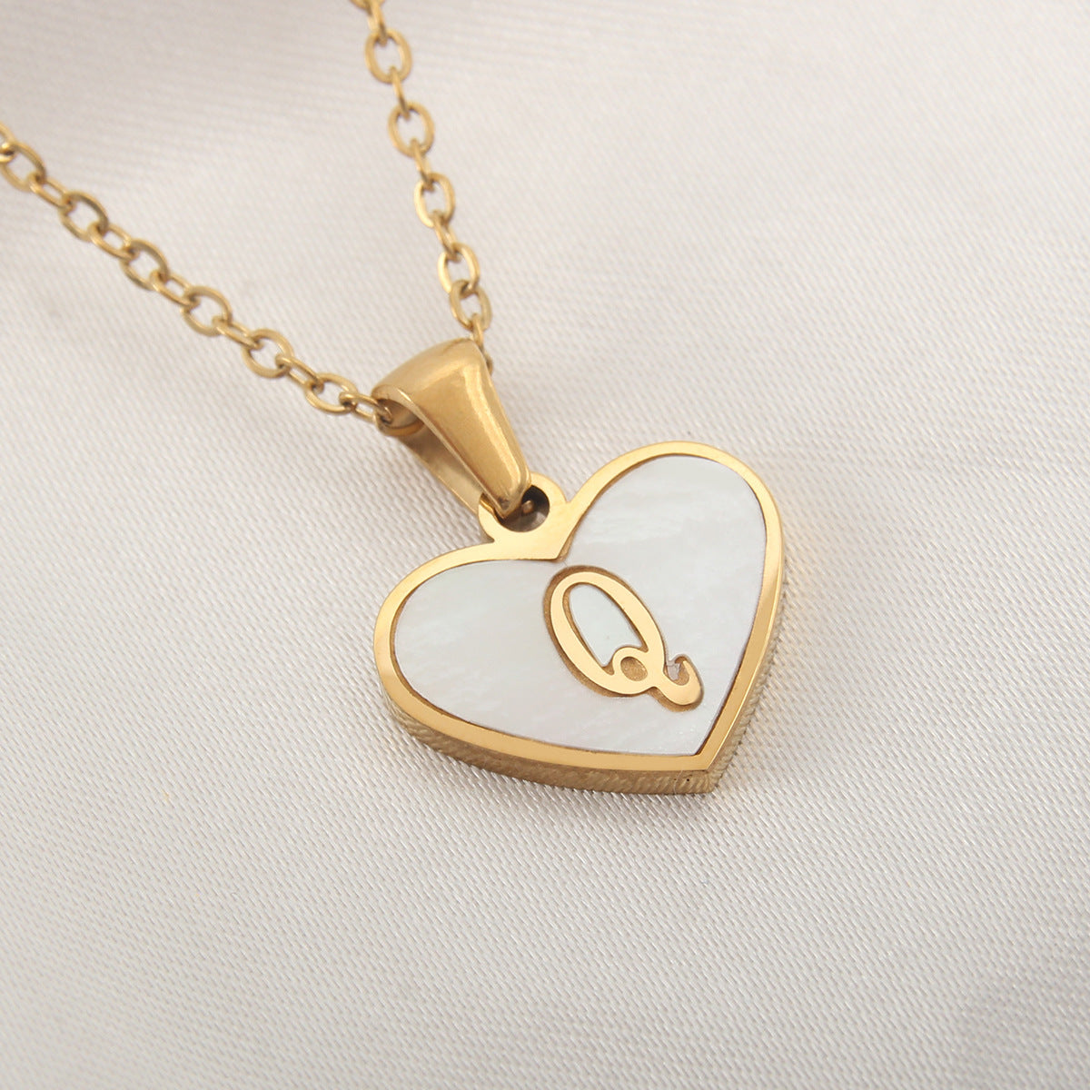 Express your individuality and love with our 26 Letter Heart-Shaped Necklace. This elegant piece allows you to wear your initial or the initial of someone special close to your heart, making it a meaningful addition to any jewelry collection.