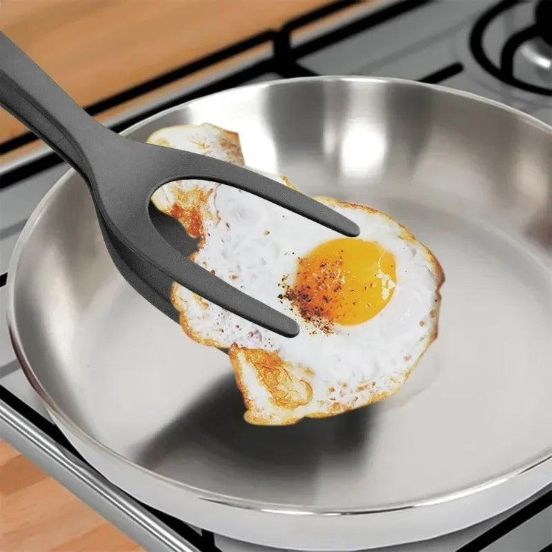 Streamline your cooking with our versatile 2-in-1 Nylon Grip Flip Tongs Egg Spatula. This innovative kitchen tool combines the functionality of tongs and a spatula, making it easier than ever to flip, grip, and serve your favorite foods