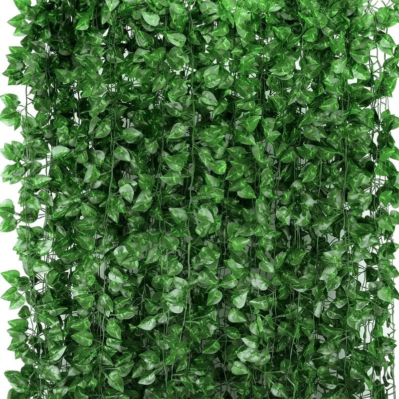 Transform any space into a lush, vibrant oasis with our Artificial Plant Green Wall Decor. Available in two convenient lengths—10 meters and 2 meters—this versatile greenery brings the beauty of nature indoors or out, without the upkeep.